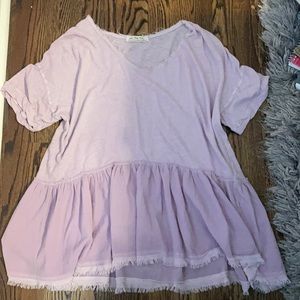 Free people flowy shirt in a lilac color